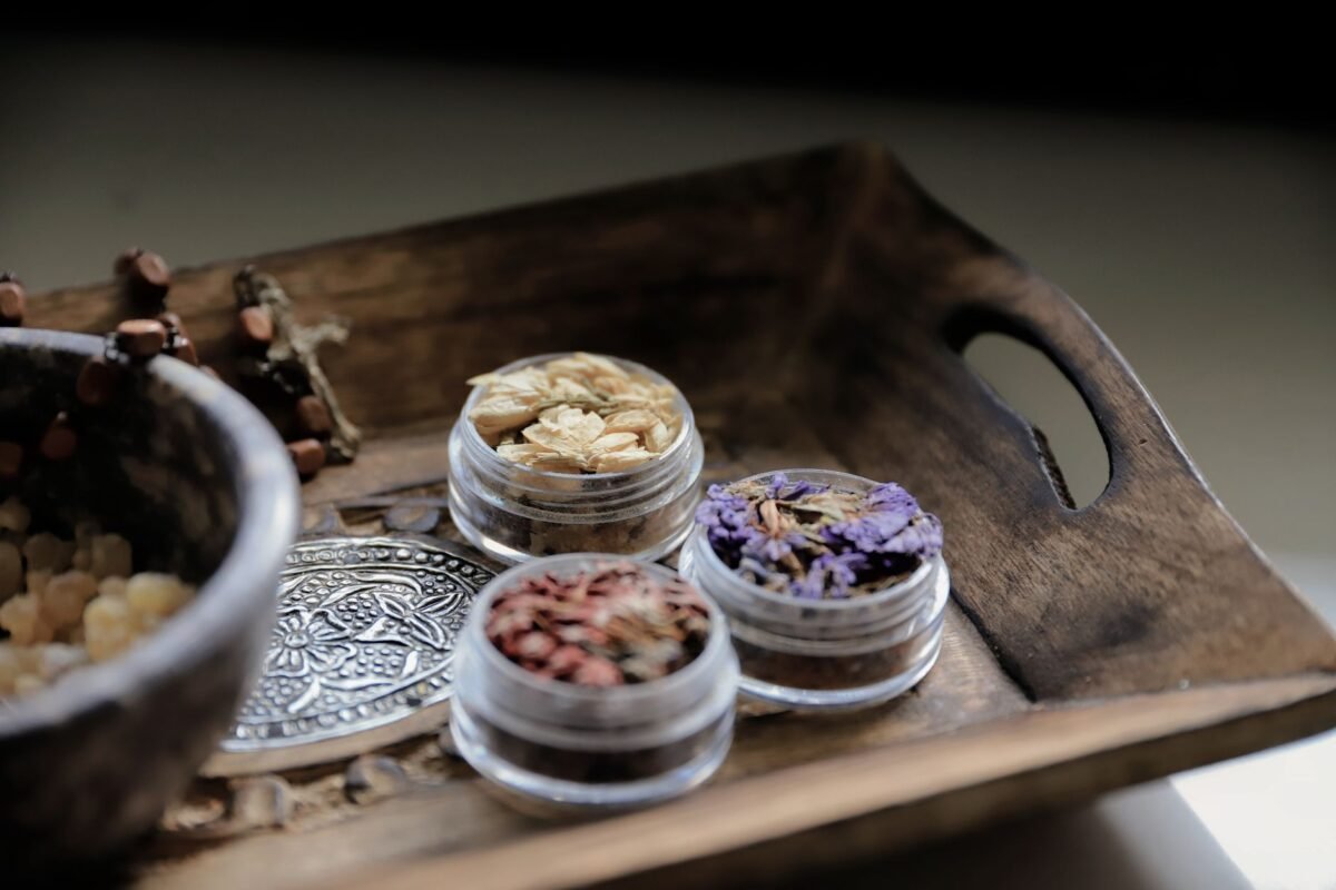 aromatic dried flowers in decorative wooden tray